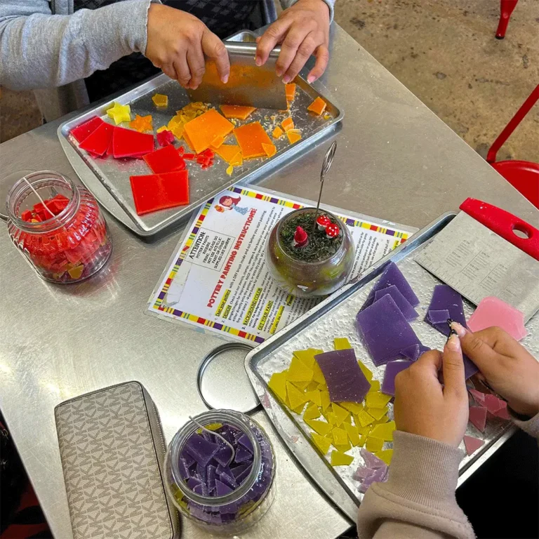Candle making art project taking place at The Hot Spot Studios Pottery Painting and more