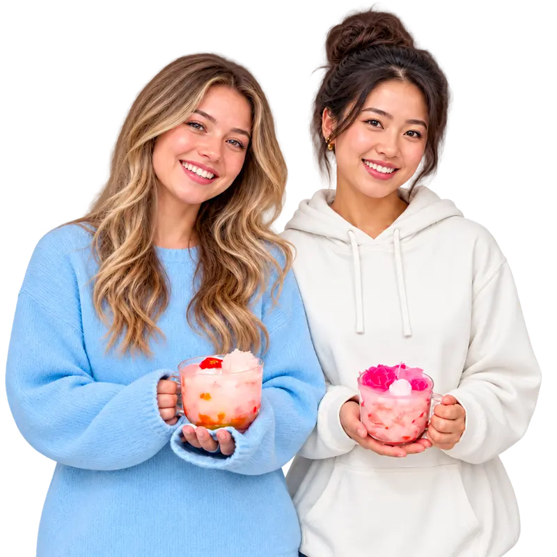 Two friends show off their handmade candles created at The Hot Spot Studios
